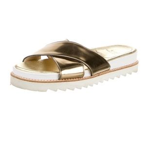Stuart Weitzman  gold metallic slides